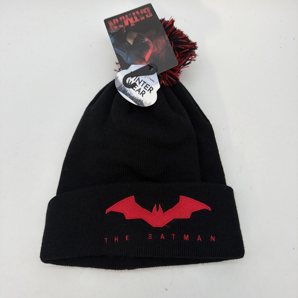 black knit beanie featuring a red "The Batman" logo